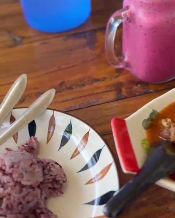 Purple sticky rice on a painted plate